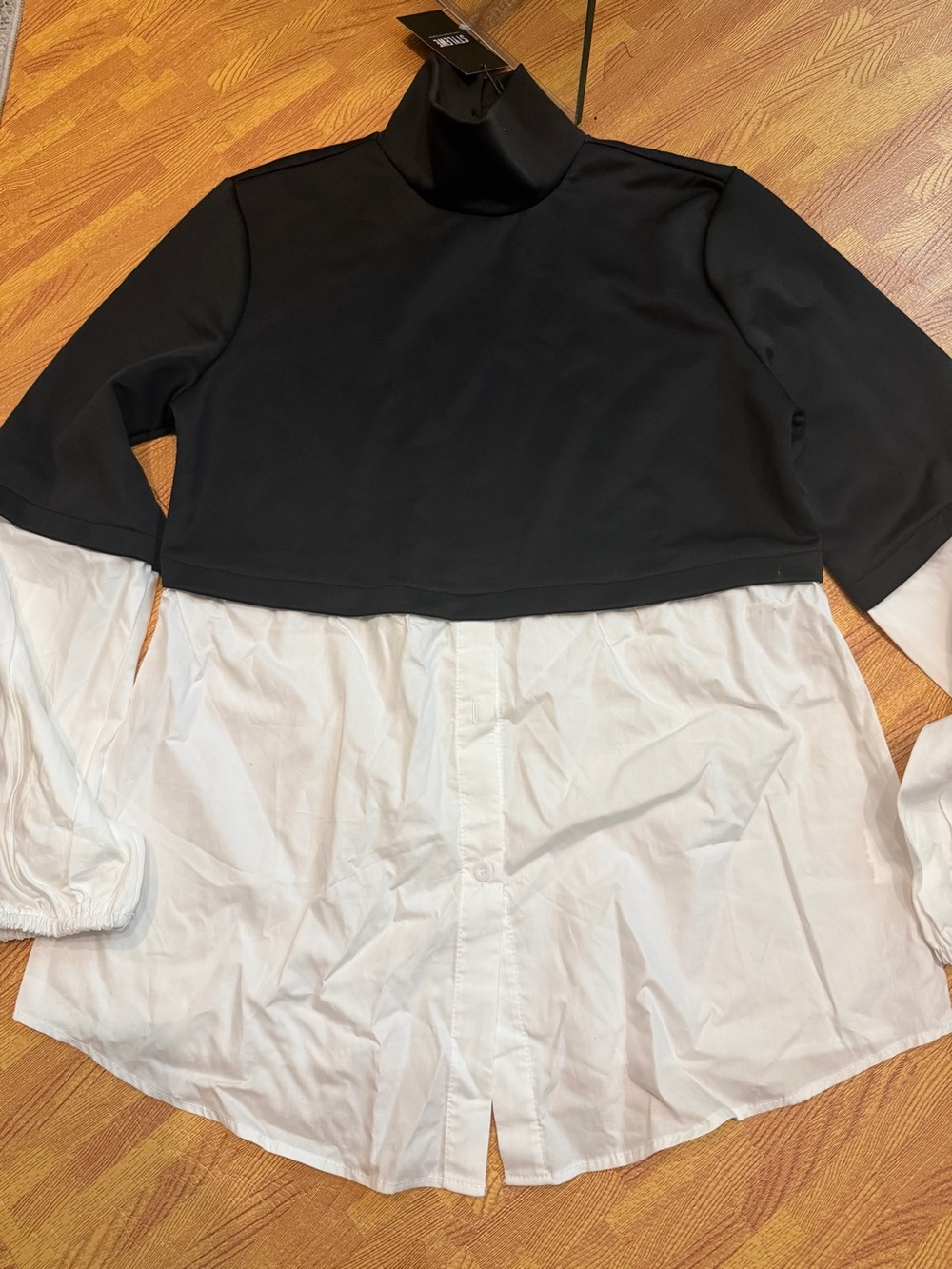 Black Cropped Turtleneck Over White Button-Front Layered Top